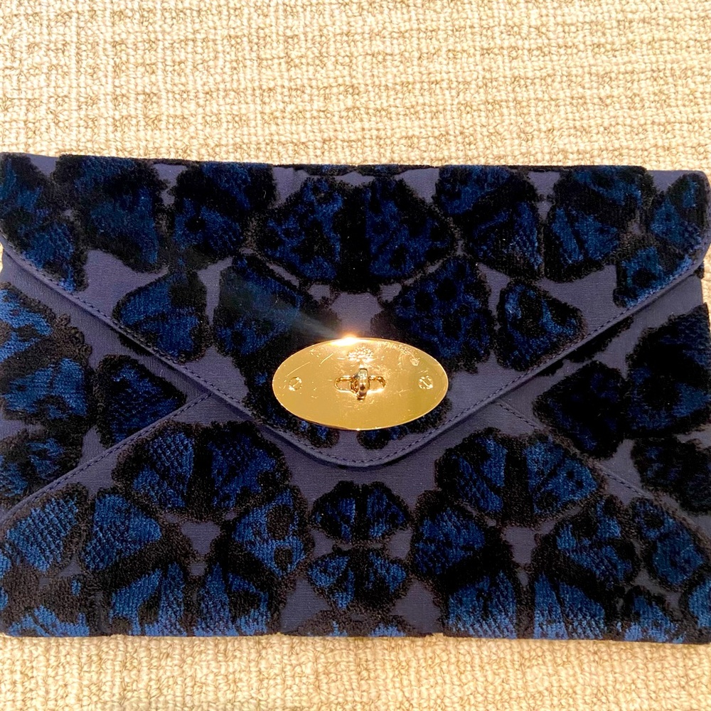 Mulberry velvet navy clutch with flower details